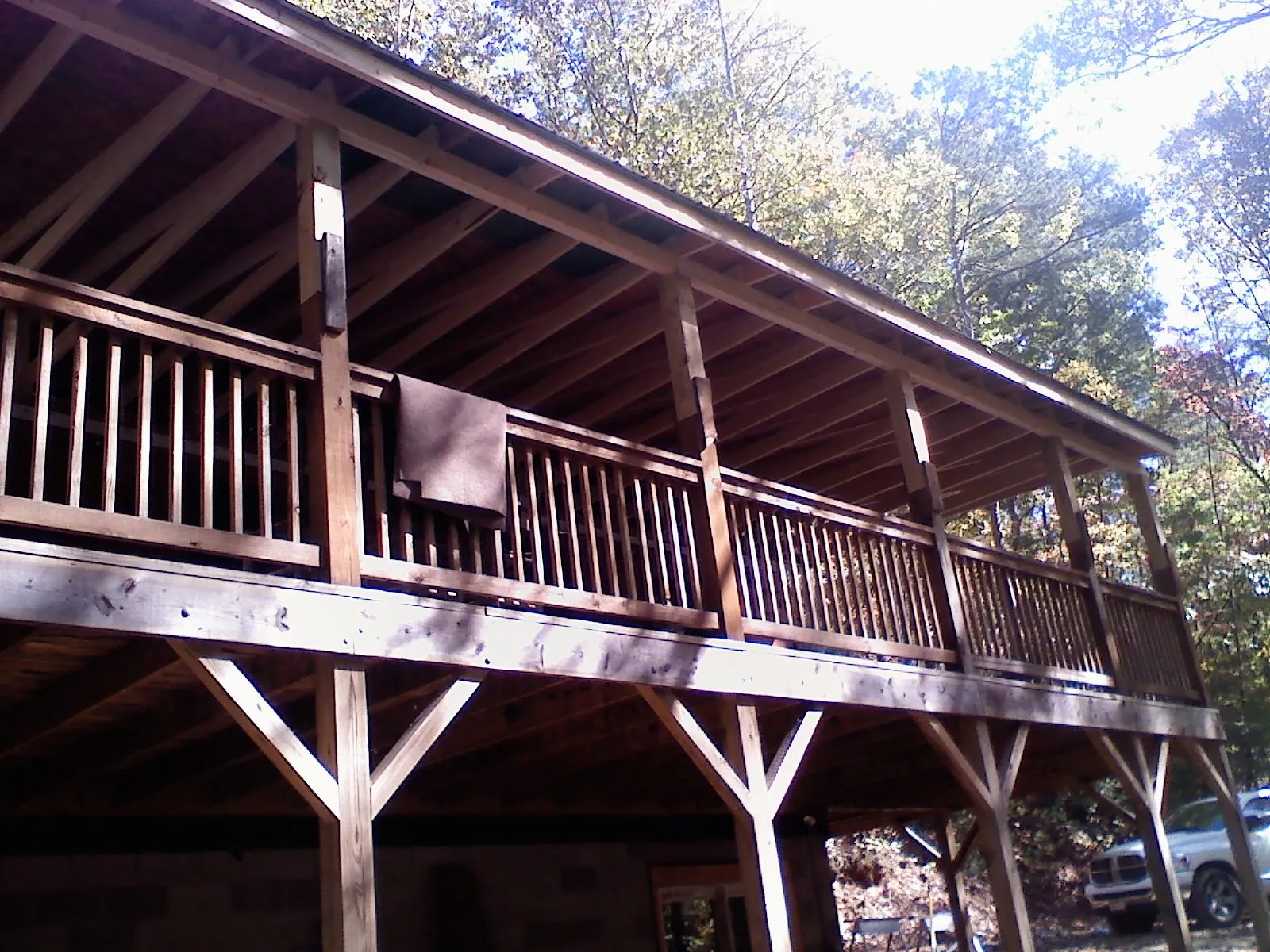 Timber framing under a new elevated porch and deck — Roof Leak Repair in Florham Park by Roofing Brothers